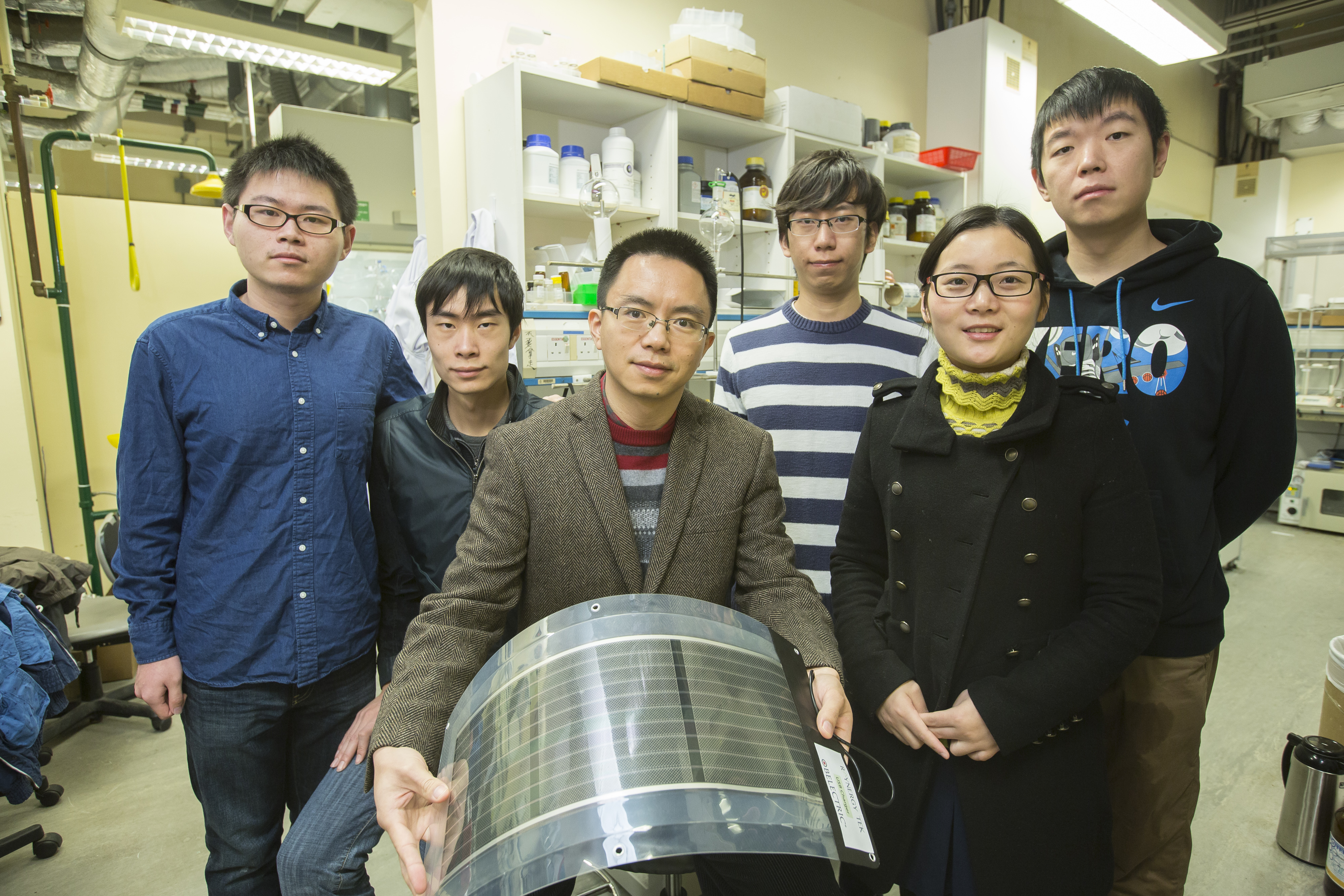 Prof. Henry He YAN (middle) and his team develop a record-efficient organic solar cell