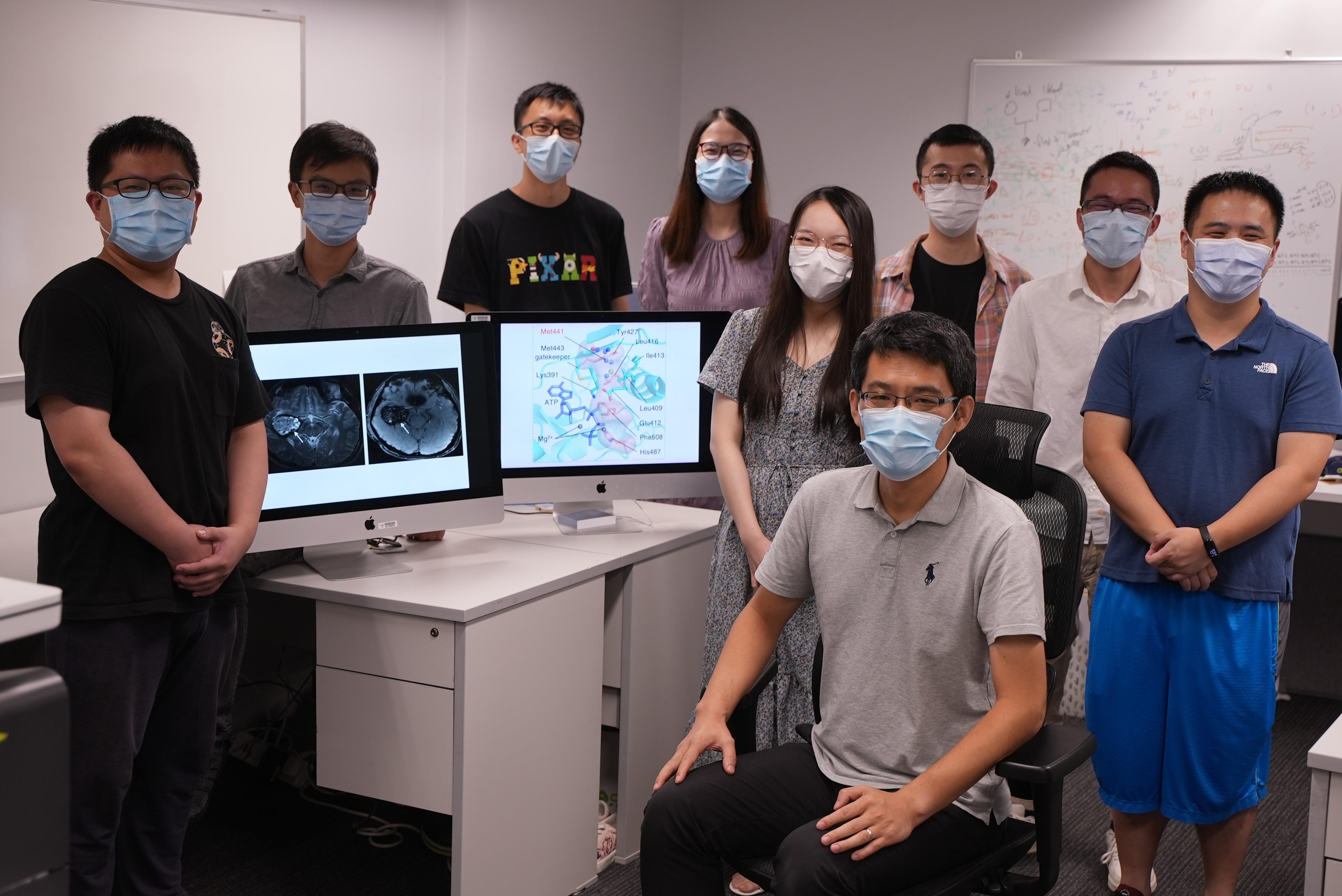 Prof. WANG Jiguang (front, seated) and his research team