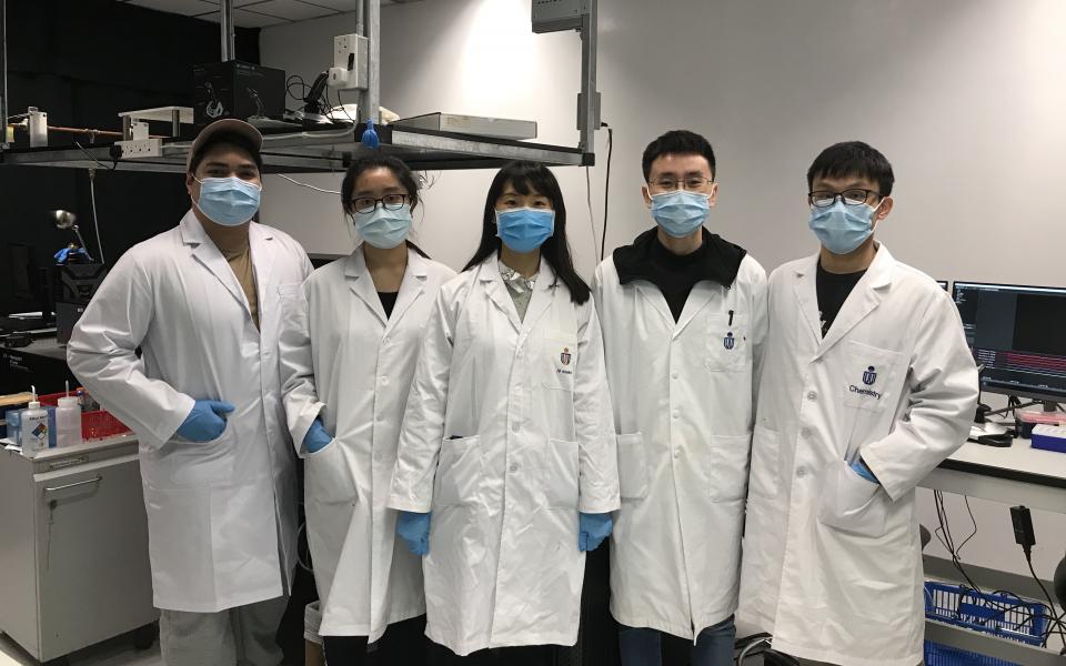 Prof. Huang (third left) and her research team.